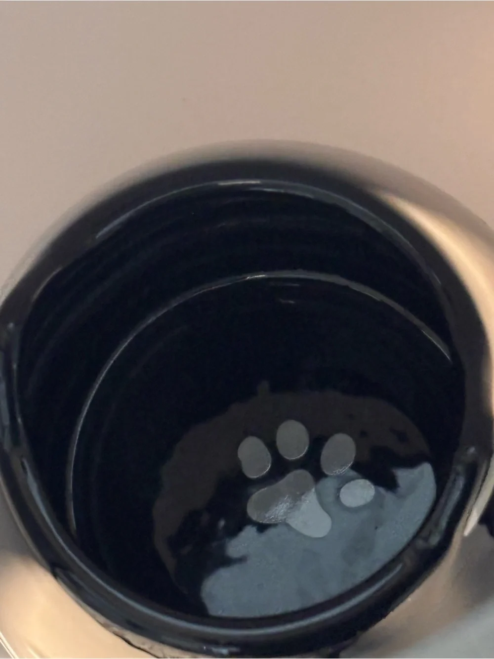 Very cute Ceramic Mug, Smiling Black Cat w Ears on Rim, Paw Print Inside.